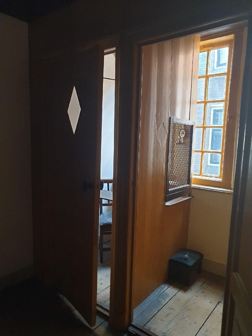 Confession box in the Museum Ons Lieve Heer op Solder Amsterdam