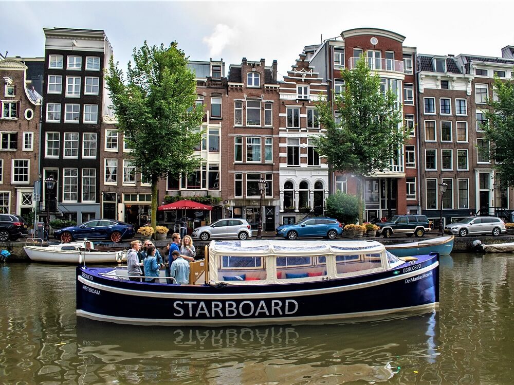 Startboard boats - blue open boat