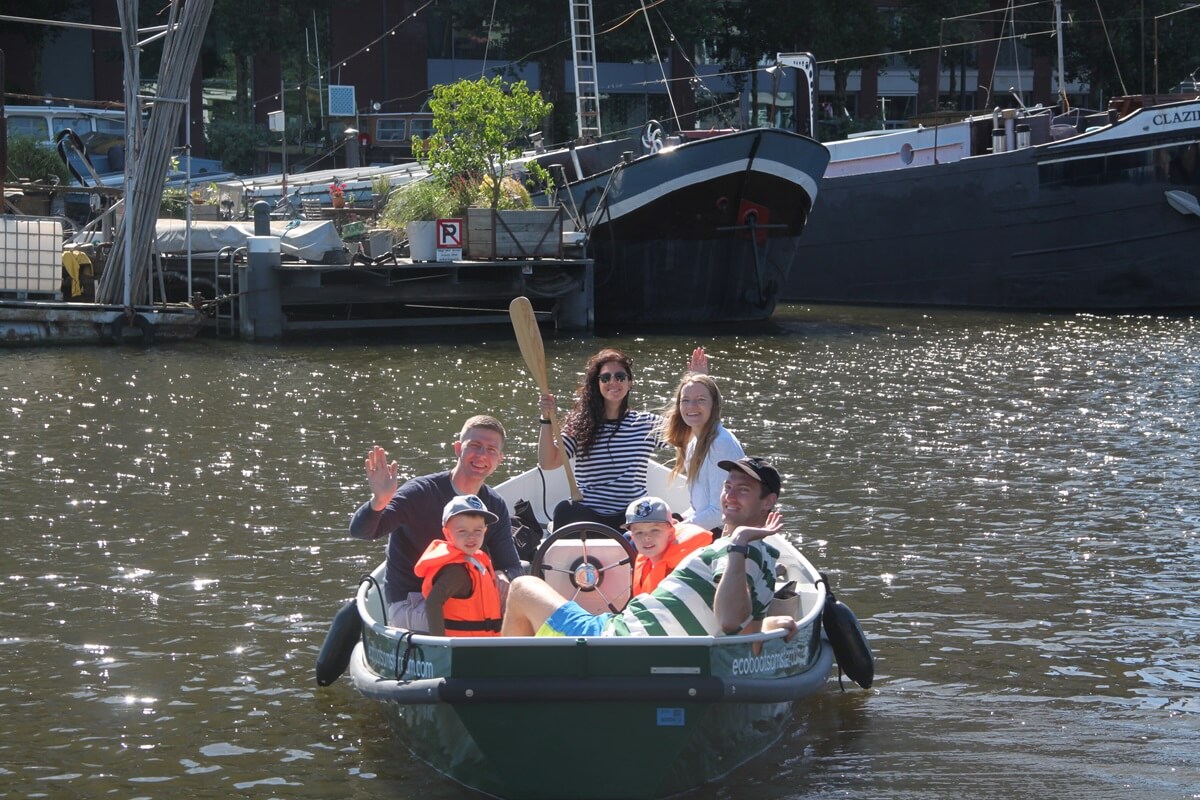 Eco Boats - boat rental - 1 - family waving from boat
