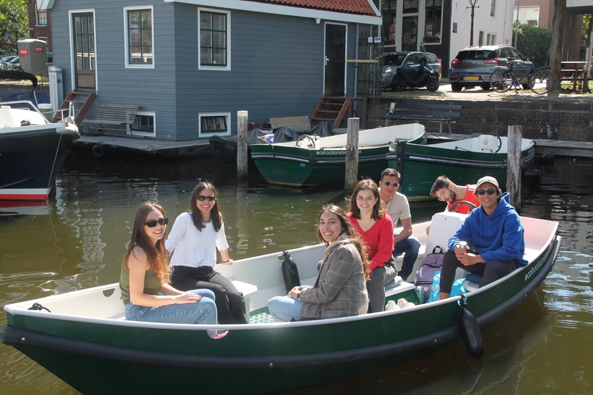 Eco Boats - boat rental - 4 - group setting sail on a sunny day